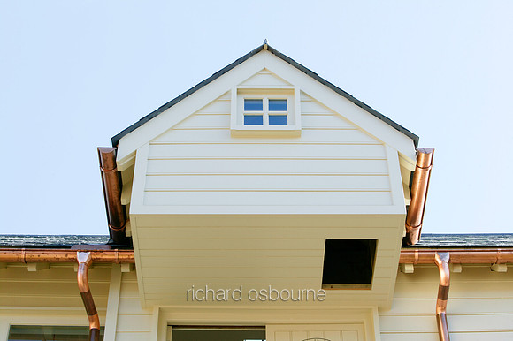V5AR4  Copper Guttering And Drain Pipes On Modern Timber Clad Building